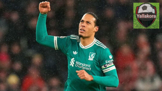 صورة لفيرجيل فان دايك وهاري ويلسون في مباراة كرة قدم، مع شعار FPL في الخلفية.